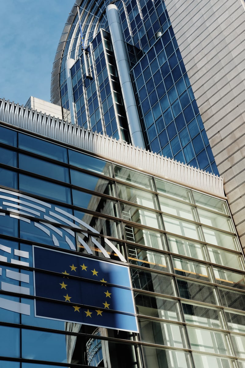 Modern High Glass Building with a European Union Flag 